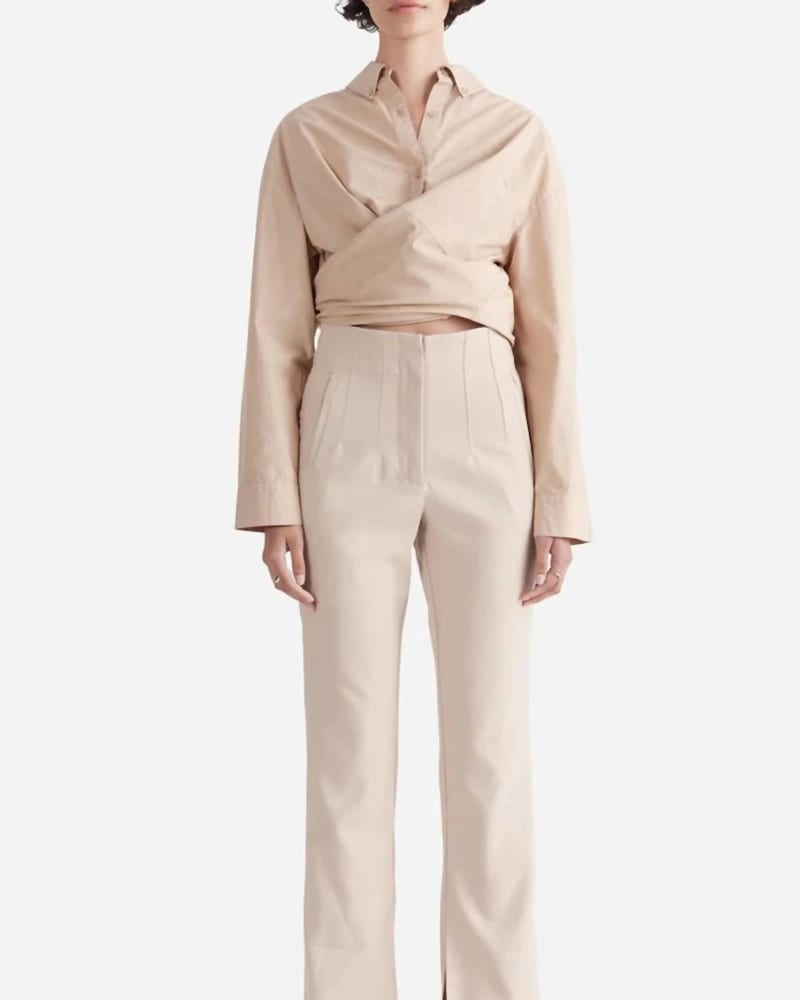 Front of a model wearing a size L Halle Split Leg Pant in Cream in Cream by ENA PELLY. | dia_product_style_image_id:338286